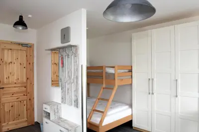 Ein Bett oder Betten in einem Zimmer der Unterkunft Pension Biohof Klügel