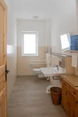 Ein Badezimmer in der Unterkunft Pension Biohof Klügel