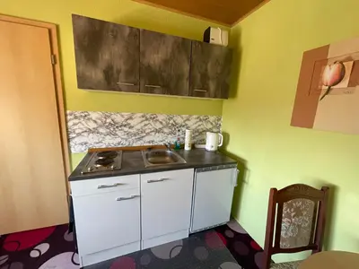 Küche/Küchenzeile in der Unterkunft Fremdenzimmer Nossen