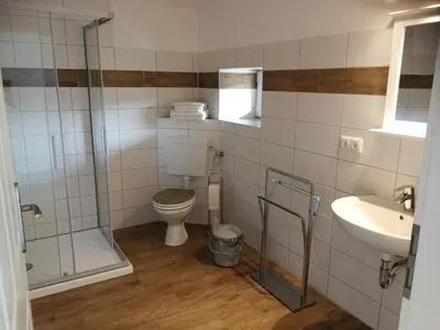 Ein Badezimmer in der Unterkunft Pension Schlossblick Thallwitz