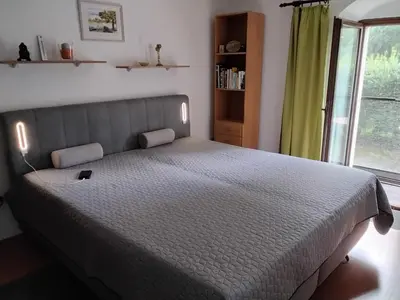 Ein Bett oder Betten in einem Zimmer der Unterkunft Ferienwohnungen im Landstreicherhaus