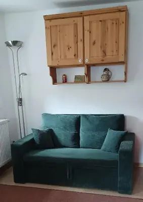 Ein Sitzbereich in der Unterkunft Ferienwohnungen im Landstreicherhaus