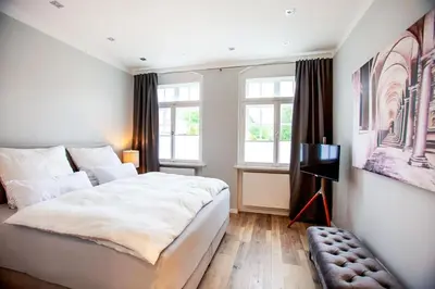 Ein Bett oder Betten in einem Zimmer der Unterkunft Wohnperle Apartment Estelle