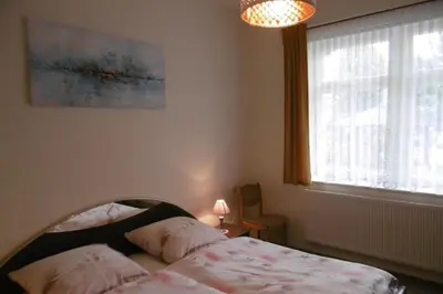 Ein Bett oder Betten in einem Zimmer der Unterkunft Ferienwohnung Rauscher
