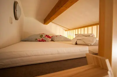 Ein Bett oder Betten in einem Zimmer der Unterkunft Pension Diener