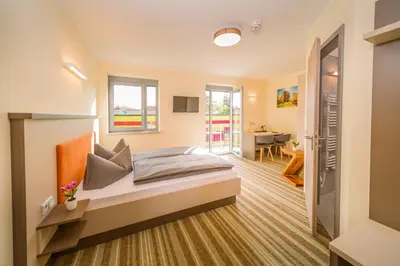 Ein Bett oder Betten in einem Zimmer der Unterkunft ELLY Hostel