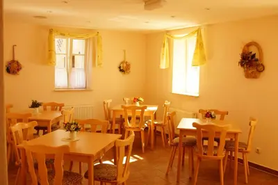 Ein Restaurant oder anderes Speiselokal in der Unterkunft Pension Prietzel