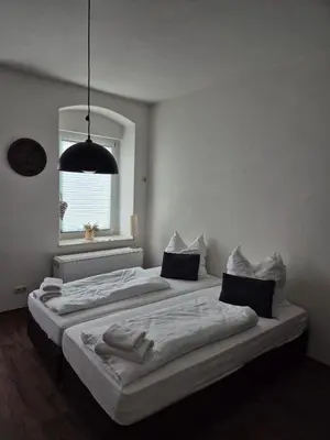 Ein Bett oder Betten in einem Zimmer der Unterkunft Pension Rudolph Riesa