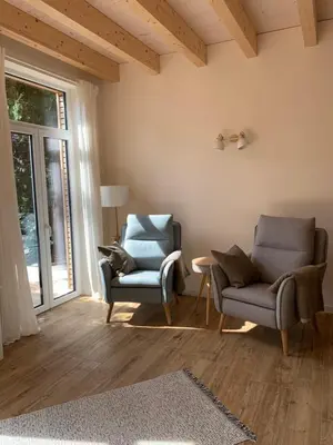 Ein Sitzbereich in der Unterkunft Ferienhaus Ulme in Naunhof Leipziger Neuseenland