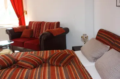 Ein Sitzbereich in der Unterkunft Villa De Baron