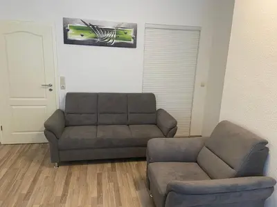Ein Sitzbereich in der Unterkunft Gästehaus Graupner-Hainichen