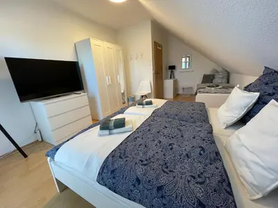 Ein Bett oder Betten in einem Zimmer der Unterkunft Ferienhaus Seenliebe