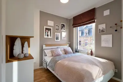 Ein Bett oder Betten in einem Zimmer der Unterkunft SweetHomes Dresden