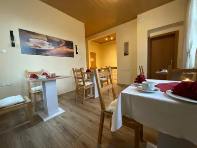 Ein Sitzbereich in der Unterkunft Pension Lindenhof