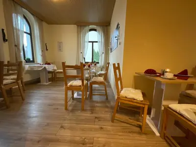 Ein Sitzbereich in der Unterkunft Pension Lindenhof