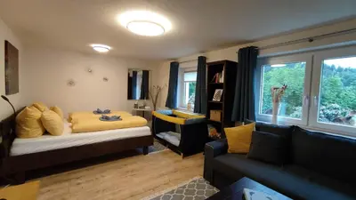 Ein Sitzbereich in der Unterkunft Feriendomizil Am Hochwald