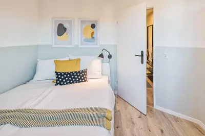 Ein Bett oder Betten in einem Zimmer der Unterkunft new apartment I cozy I Netflix I WLAN I near airport