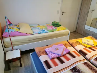 Ein Bett oder Betten in einem Zimmer der Unterkunft Reichstädter Ferienidyll