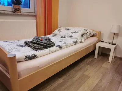 Ein Bett oder Betten in einem Zimmer der Unterkunft Reichstädter Ferienidyll