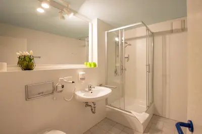 Ein Badezimmer in der Unterkunft Erzgebirgshotel Freiberger Höhe