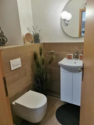 Ein Badezimmer in der Unterkunft Gemütliche Ferienwohnung