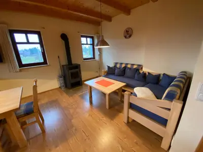 Ein Sitzbereich in der Unterkunft Waldhaus am Lilienstein