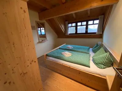 Ein Bett oder Betten in einem Zimmer der Unterkunft Waldhaus am Lilienstein