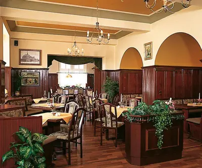 Ein Restaurant oder anderes Speiselokal in der Unterkunft Hotel - Restaurant Kurhaus Klotzsche