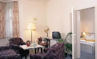 Ein Sitzbereich in der Unterkunft Hotel - Restaurant Kurhaus Klotzsche