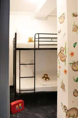 Ein Bett oder Betten in einem Zimmer der Unterkunft Hotel zur Kulturweberei