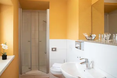 Ein Badezimmer in der Unterkunft Hotel zur Kulturweberei