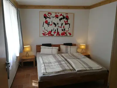 Ein Bett oder Betten in einem Zimmer der Unterkunft Ferienwohnung Bruno