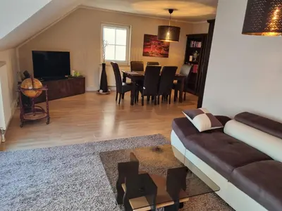 Ein Sitzbereich in der Unterkunft Ferienwohnung mit Pool am Stadtrand von Dresden