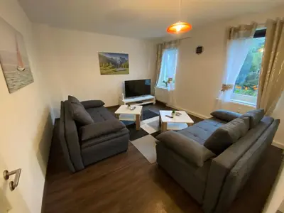 Ein Sitzbereich in der Unterkunft Ferienwohnung Pension Sofia
