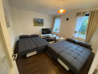 Ein Bett oder Betten in einem Zimmer der Unterkunft Ferienwohnung Pension Sofia