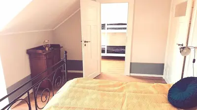 Ein Bett oder Betten in einem Zimmer der Unterkunft Villa Weißbach - Haus Hilda