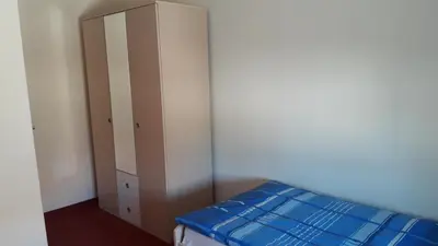 Ein Bett oder Betten in einem Zimmer der Unterkunft Gemütliche Ferienwohnung in ländlicher Lage