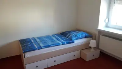 Ein Bett oder Betten in einem Zimmer der Unterkunft Gemütliche Ferienwohnung in ländlicher Lage