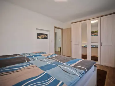 Ein Bett oder Betten in einem Zimmer der Unterkunft Ferienwohnung in der Sportstadt Riesa