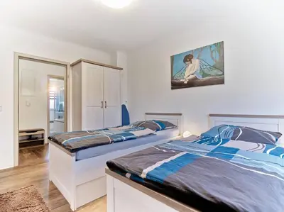 Ein Bett oder Betten in einem Zimmer der Unterkunft Ferienwohnung in der Sportstadt Riesa