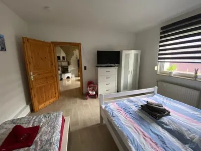 Ein Bett oder Betten in einem Zimmer der Unterkunft Ferienhaus Victoria