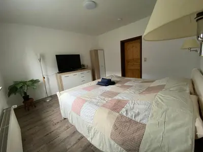Ein Bett oder Betten in einem Zimmer der Unterkunft Ferienhaus Victoria