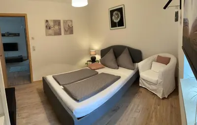 Ein Bett oder Betten in einem Zimmer der Unterkunft Ferienwohnung Klitzschen Nähe Torgau