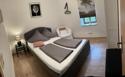 Ein Bett oder Betten in einem Zimmer der Unterkunft Ferienwohnung Klitzschen Nähe Torgau