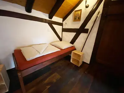 Ein Bett oder Betten in einem Zimmer der Unterkunft Ungewöhnliches Ferienhaus NAMIBIA-LODGE für 6 Pers - Rittergut Leppersdorf vor Radeberg bei Dresden