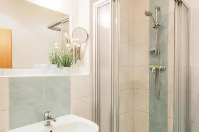 Ein Badezimmer in der Unterkunft Gästehaus am Kurpark