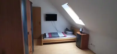 Ein Bett oder Betten in einem Zimmer der Unterkunft Ferienhaus Fabich Ganzes Haus