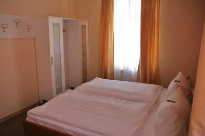 Ein Bett oder Betten in einem Zimmer der Unterkunft Pension Dresdener Panorama
