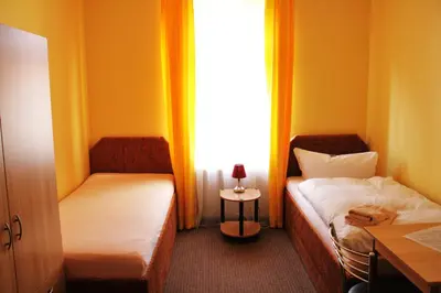 Ein Bett oder Betten in einem Zimmer der Unterkunft Pension Dresdener Panorama