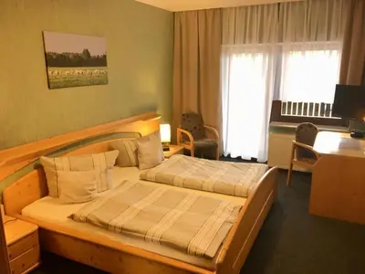 Ein Bett oder Betten in einem Zimmer der Unterkunft Gasthaus Stuckatz